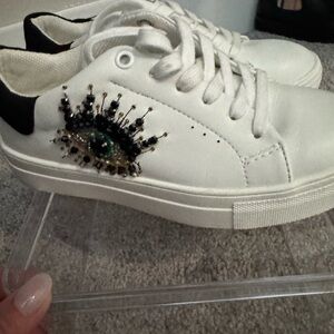 White Sneakers with Eye Embellishment